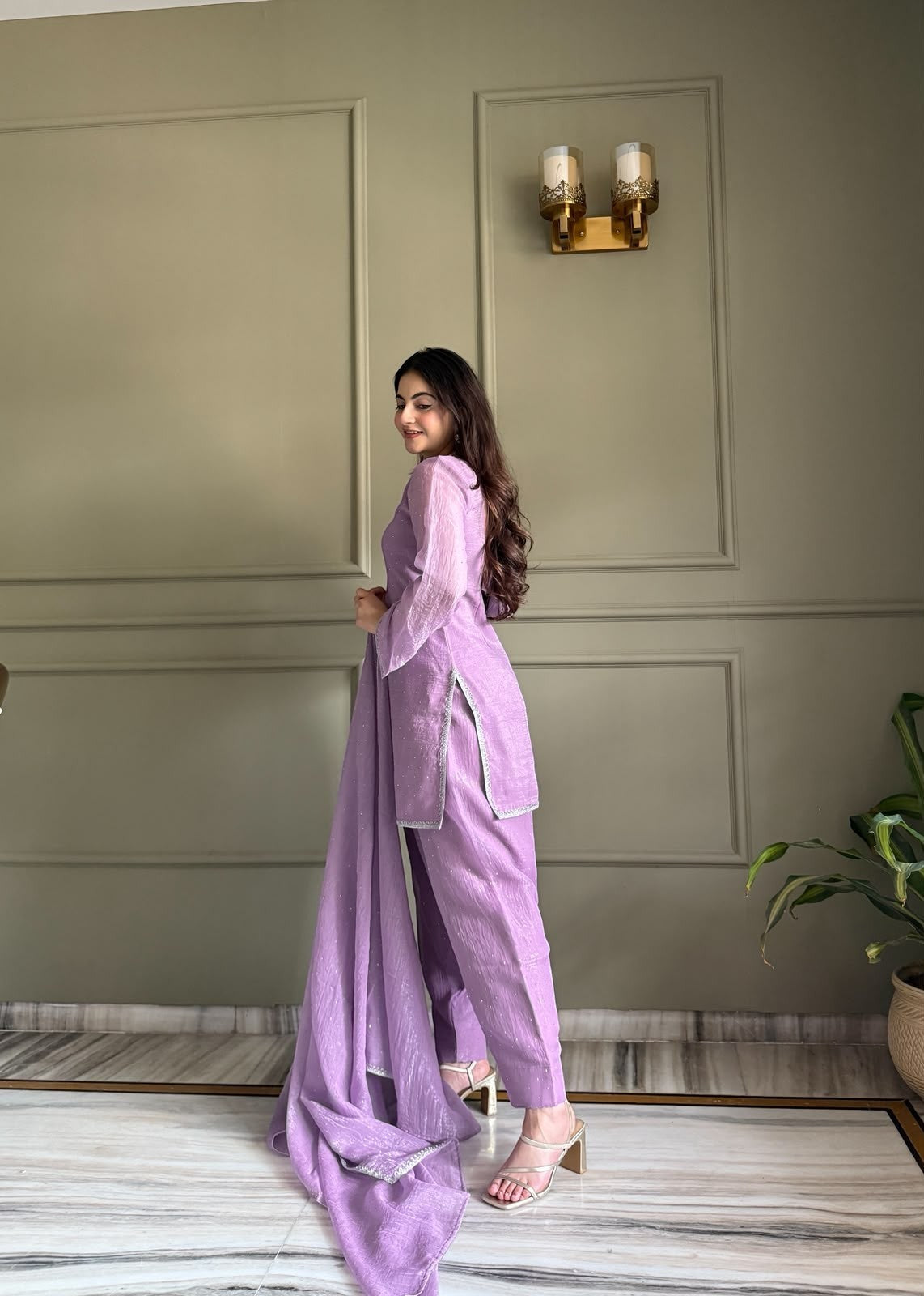 Inaaya Store lavender crunchy silk 3-piece suit with Siroski work and fancy lace trim worn by a woman